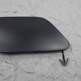Nissan LEAF OEM Front Bumper Tow Bracket Cover - Macro Bottom 1