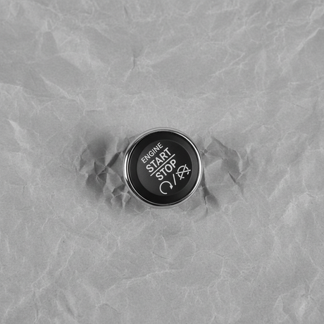 Full View - Engine Start Stop Button on Grey Kraft Paper