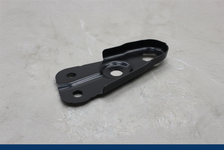 2023-2025 Honda HR-V Radiator Support Upper Bracket OEM - Detail view on gray kraft paper