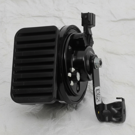2018-2026 Jeep Wrangler Gladiator High Note Horn and Bracket OEM close-up detail on grey wrinkled kraft paper background