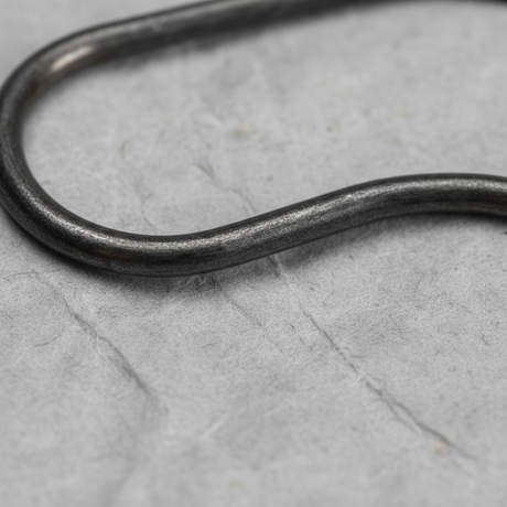 Bottom macro crop on light grey wrinkled kraft paper background