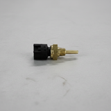 Engine coolant temperature sensor on grey wrinkled kraft paper background
