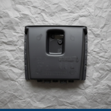 2008-2024 Chevrolet Express/GMC Savana Dashboard Lower Compartment Door OEM - rotated on kraft paper