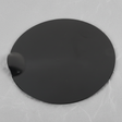 Full view of Ford F-150 fuel tank filler door on light grey wrinkled kraft paper