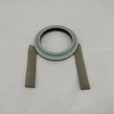 Acura MDX ZDX front strut bearing on light grey wrinkled kraft paper background, packaging removed