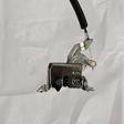 Full view of sliding door latch on light grey wrinkled kraft paper