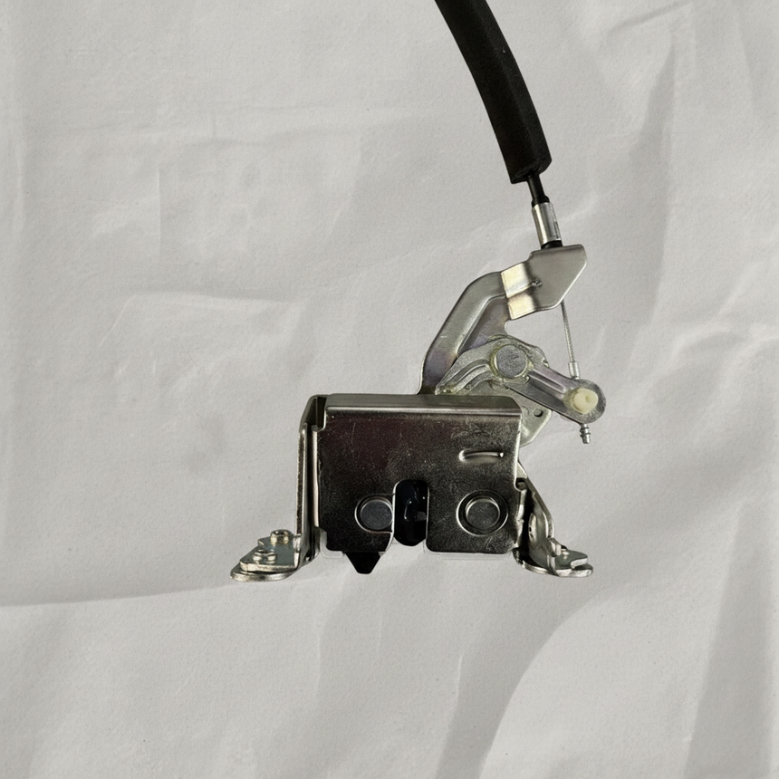 Full view of sliding door latch on light grey wrinkled kraft paper