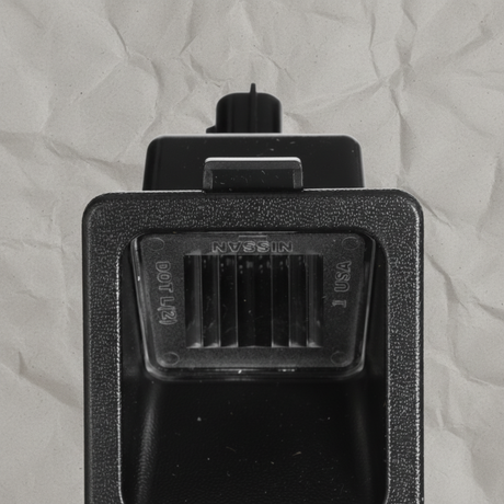 2016-2025 Nissan Titan Titan XD Frontier Rear License Plate Light OEM - Middle Detail Angle 2