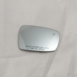 OEM Heated Passenger Mirror Glass on grey wrinkled craft paper background