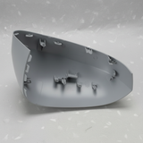 2024-2025 Nissan Rogue Driver Side Door Mirror Cover - Back view gray primer on kraft paper