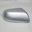 2012-2016 CR-V OEM Passenger Side Mirror Cap Alabaster Silver NH700M on grey wrinkled kraft paper background