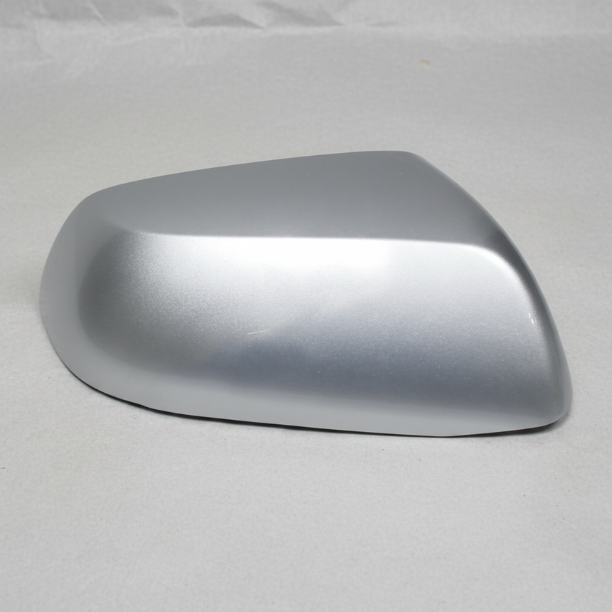 2012-2016 CR-V OEM Passenger Side Mirror Cap Alabaster Silver NH700M on grey wrinkled kraft paper background