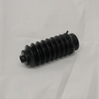 Honda CR-V Civic driver side rack pinion bellows on light grey wrinkled kraft paper background, packaging removed