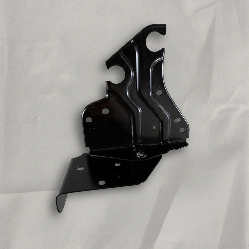 Full view of battery tray bracket on light grey wrinkled kraft paper