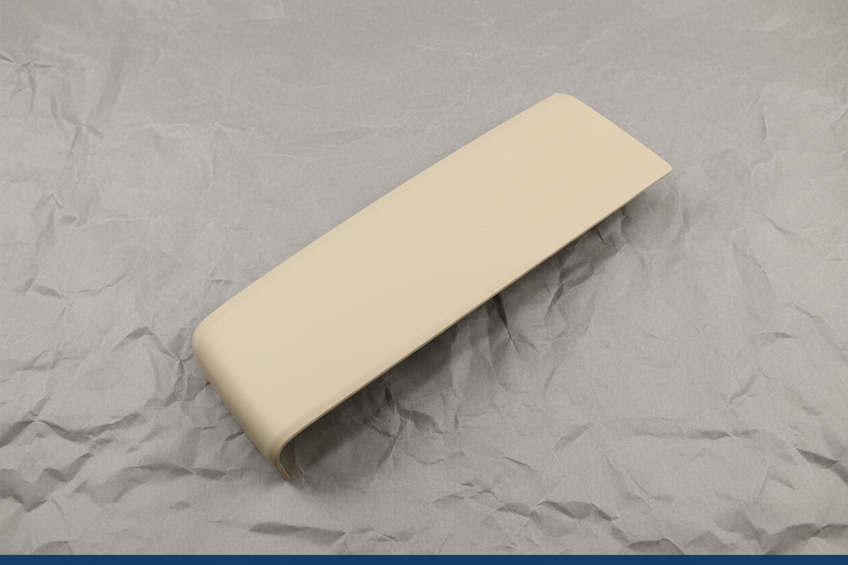 2015-2017 Ford Expedition Navigator Seat Track Cover Dune - Detail view on gray kraft paper