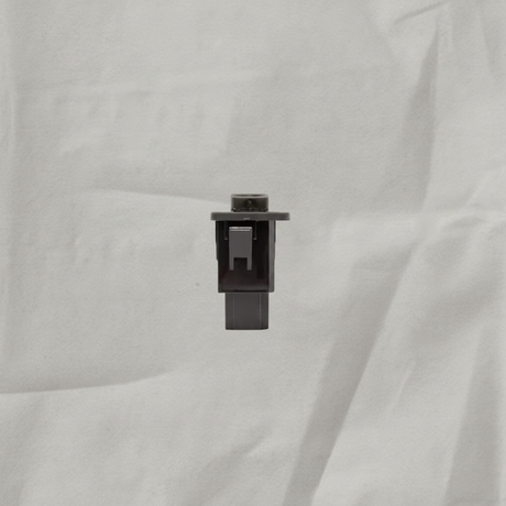 Honda Pilot Accord Crosstour front auxiliary jack on light grey wrinkled kraft paper background, packaging removed
