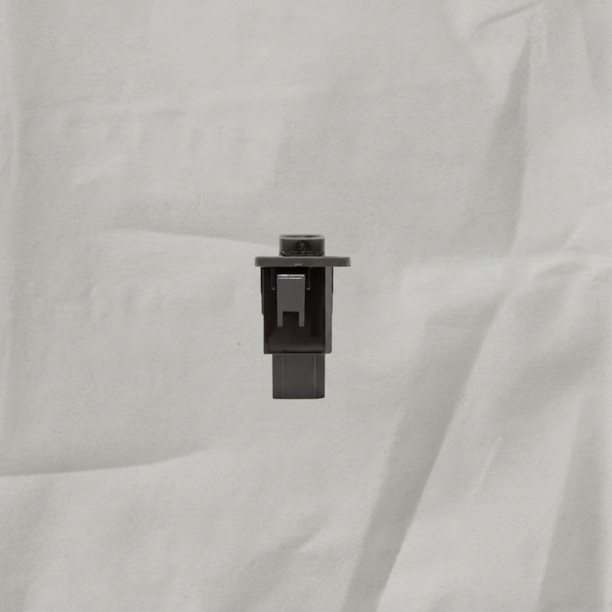 Honda Pilot Accord Crosstour front auxiliary jack on light grey wrinkled kraft paper background, packaging removed