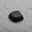 Full View - Jet Black Lumbar Actuator Knob on Grey Kraft Paper