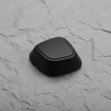 Full View - Jet Black Lumbar Actuator Knob on Grey Kraft Paper