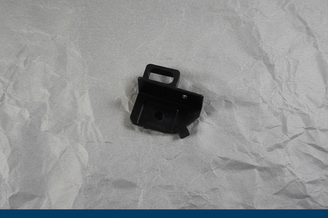 2018-2021 Buick Enclave Chevrolet Traverse Grille Support - 27 degree rotation with gray kraft paper background