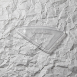 Full view on light grey wrinkled kraft paper background