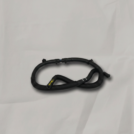 Radiator Surge Tank Inlet Hose on grey wrinkled kraft paper background