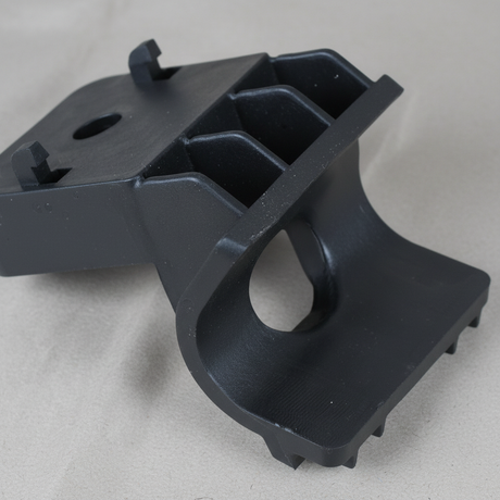 2015-2022 Trax or Encore W/ High Output Engine Radiator Upper Bracket OEM – Middle detail on light grey kraft paper