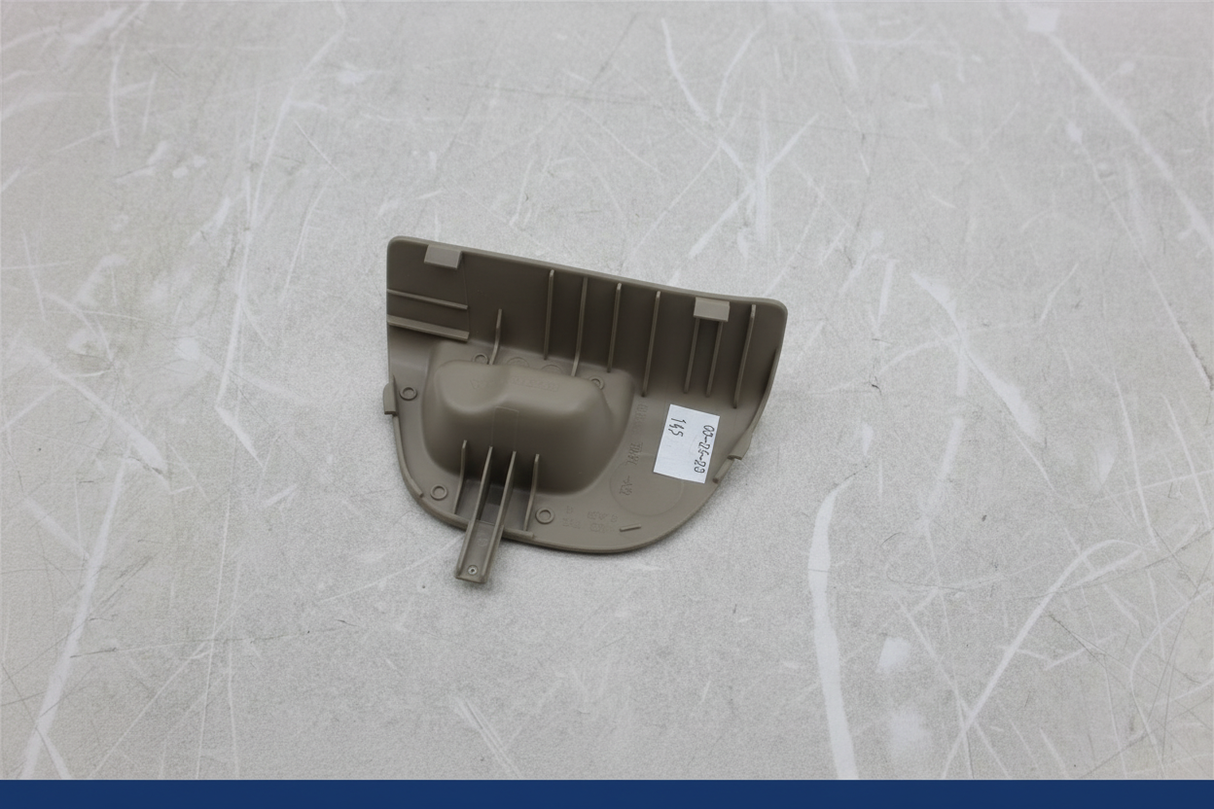 2018-2024 Honda Odyssey Driver Side 2nd Row Seat Trim Beige YR507L Genuine OEM close-up on gray kraft paper