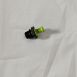 PCV valve on grey wrinkled kraft paper background