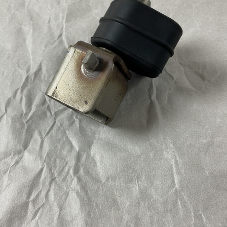 2015-2023 Charger or 300 Passenger Side Rear Exhaust Hanger Bracket OEM – Bottom Macro Crop on kraft paper