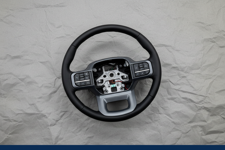 Ford Super Duty Lariat black leather heated steering wheel rotated view