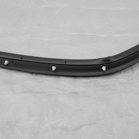 Close-up alternate angle of Nissan OEM Passenger Side Rear Door Mounted Weatherstrip for Versa
