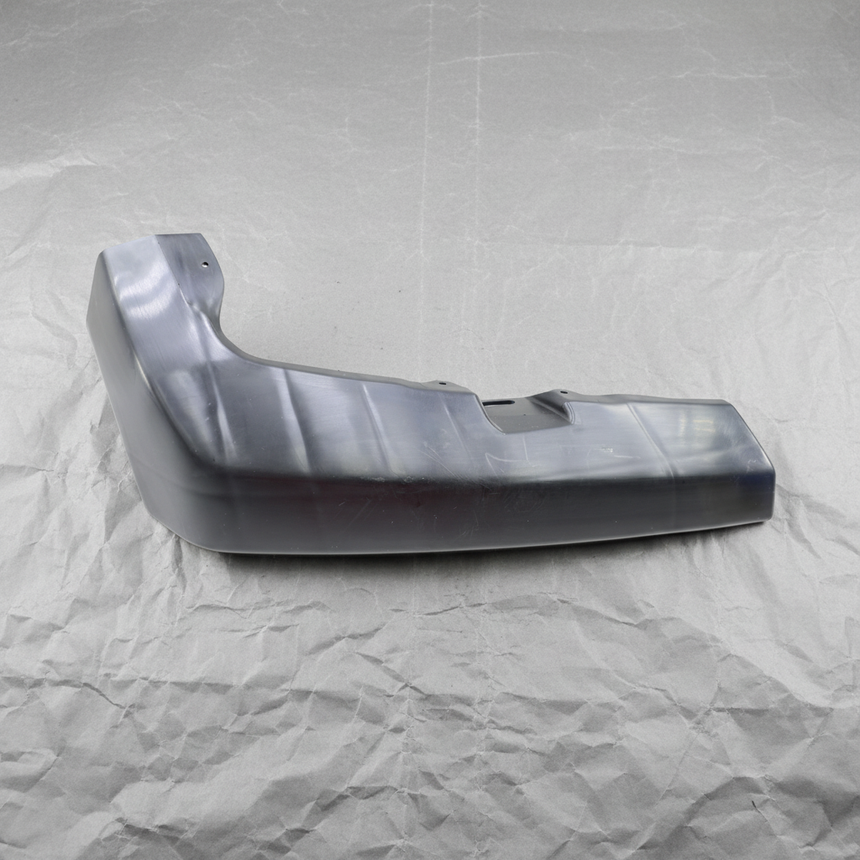 2009-2019 Nissan Frontier OEM Front Passenger Side Bumper Bracket Chrome - Full View 1