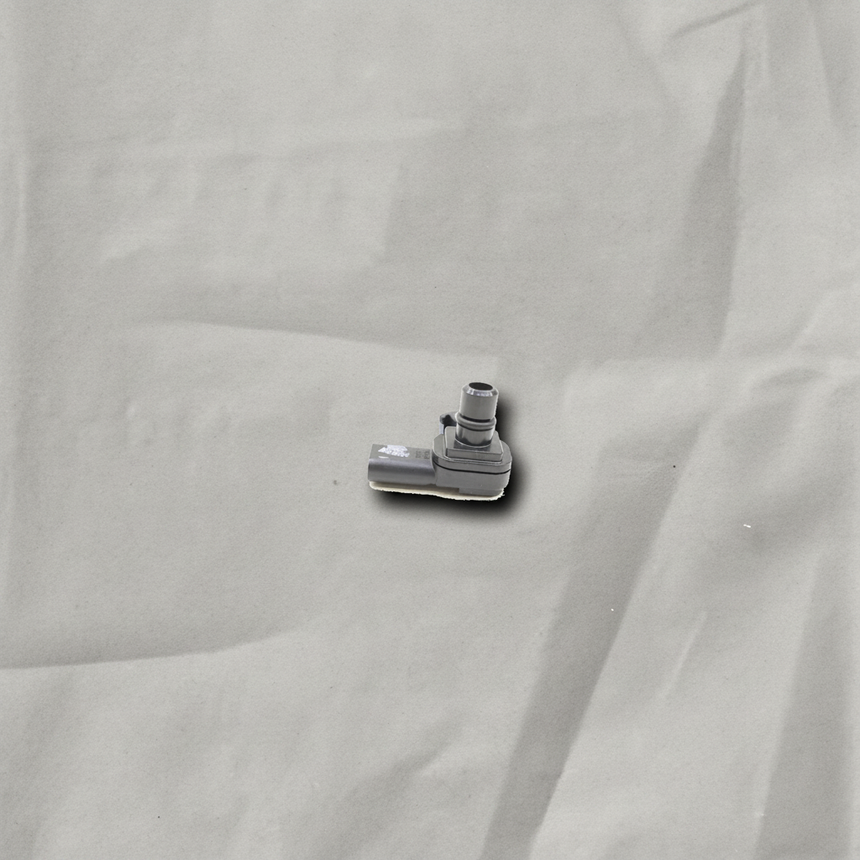 GM Duramax MAP Sensor on gray wrinkle kraft paper background