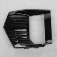 Full view of GMC Yukon fog light lamp bezel trim on light grey wrinkled kraft paper