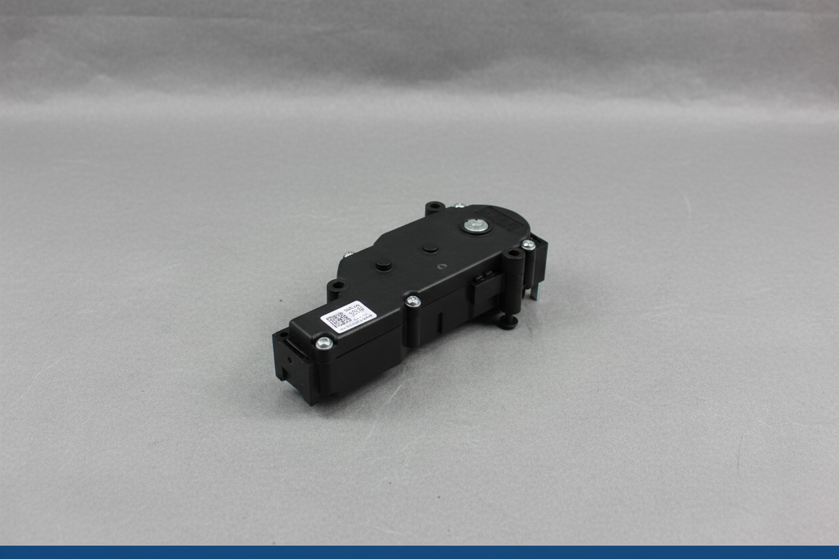 2020-2025 Ford Explorer Aviator Seat Adjuster Motor - Detail view on gray kraft paper