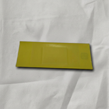 Acura MDX RDX RLX TLX rain sensor adhesive kit on light grey wrinkled kraft paper background, packaging removed