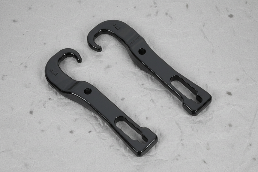 2019-2024 Nissan Titan Front Bumper Tow Hooks Kit Black 2-Piece OEM