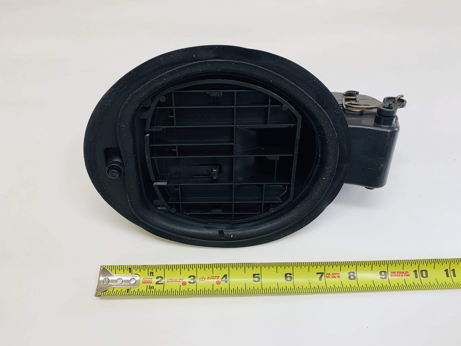 BB5Z-7827936-A-B7 2011-2019 Ford Explorer Fuel Tank Filler Door Hinge Housing Pocket - New Genuine Ford Part